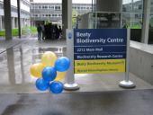 Beaty Museum sign and preview event table in background